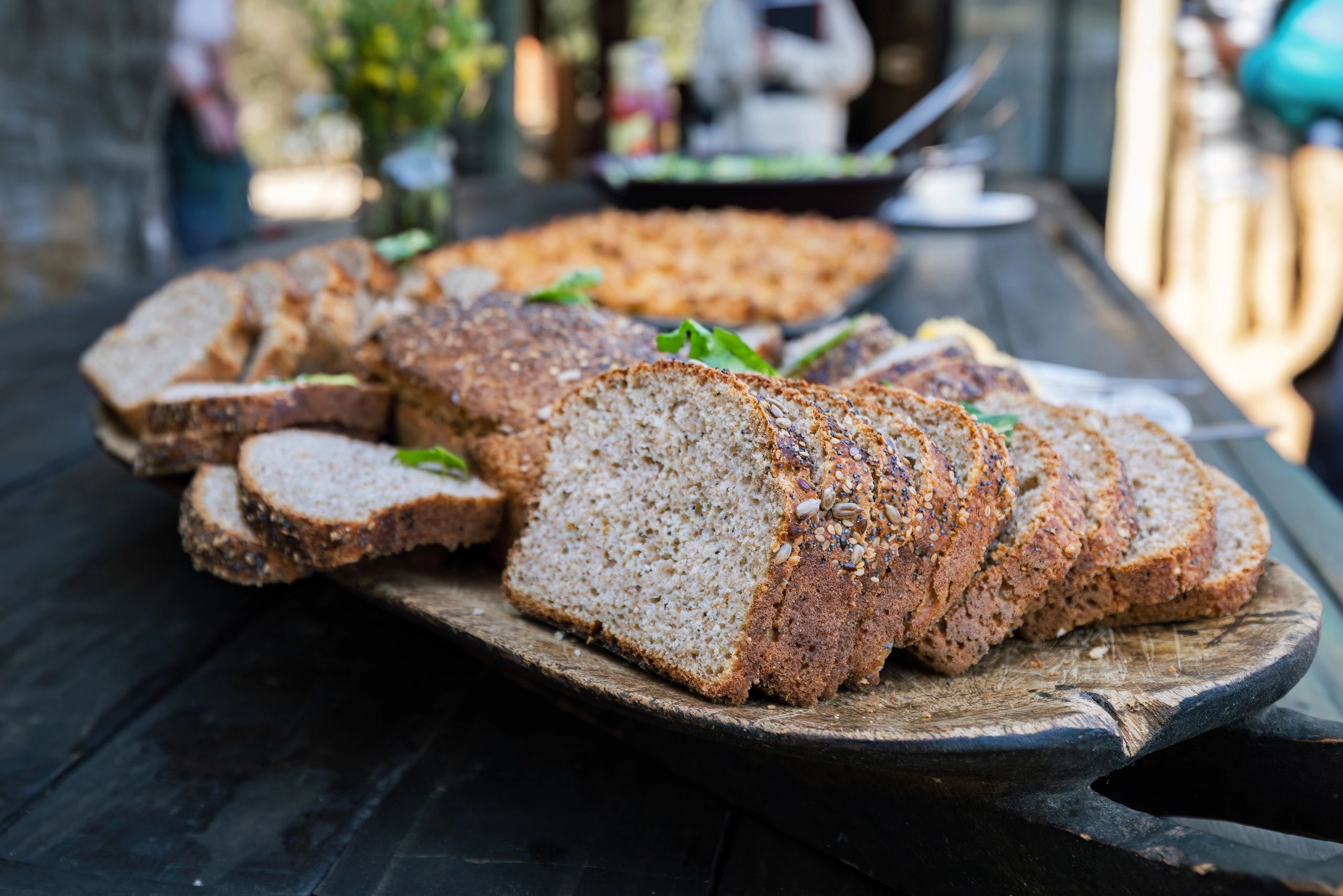 Artisan sourdough bread displayed on a wooden table